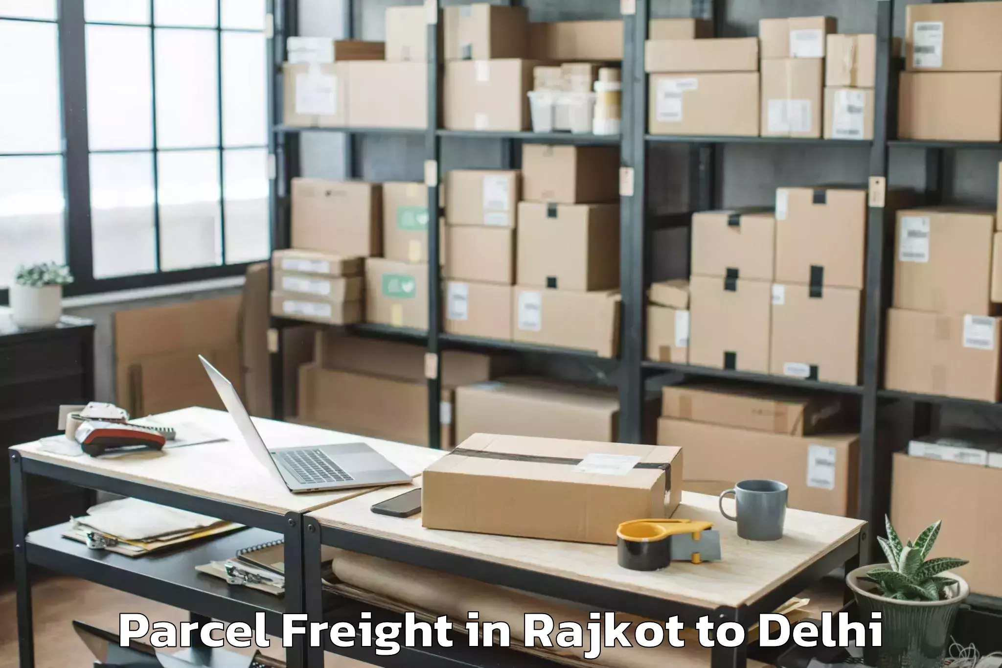 Expert Rajkot to Unity One Mall Rohini Parcel Freight